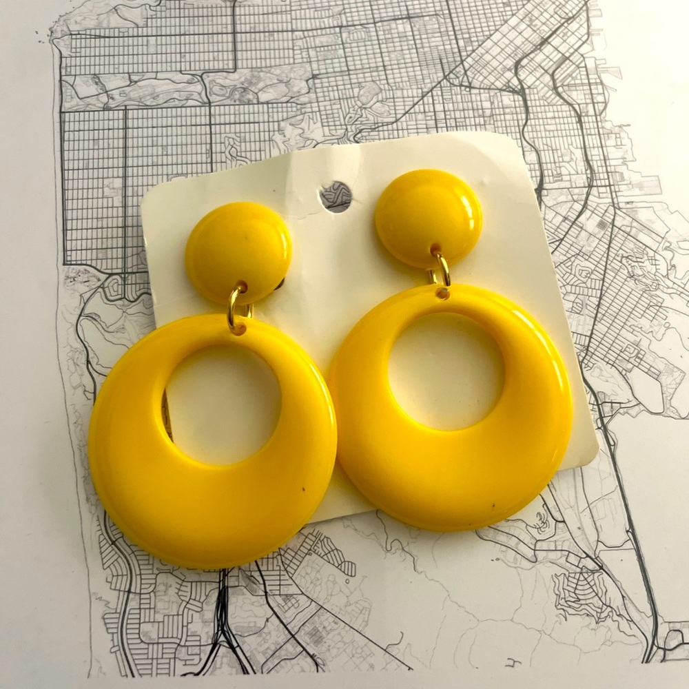 80’s retro yellow 3" long earrings with omega clip for pierced ears.